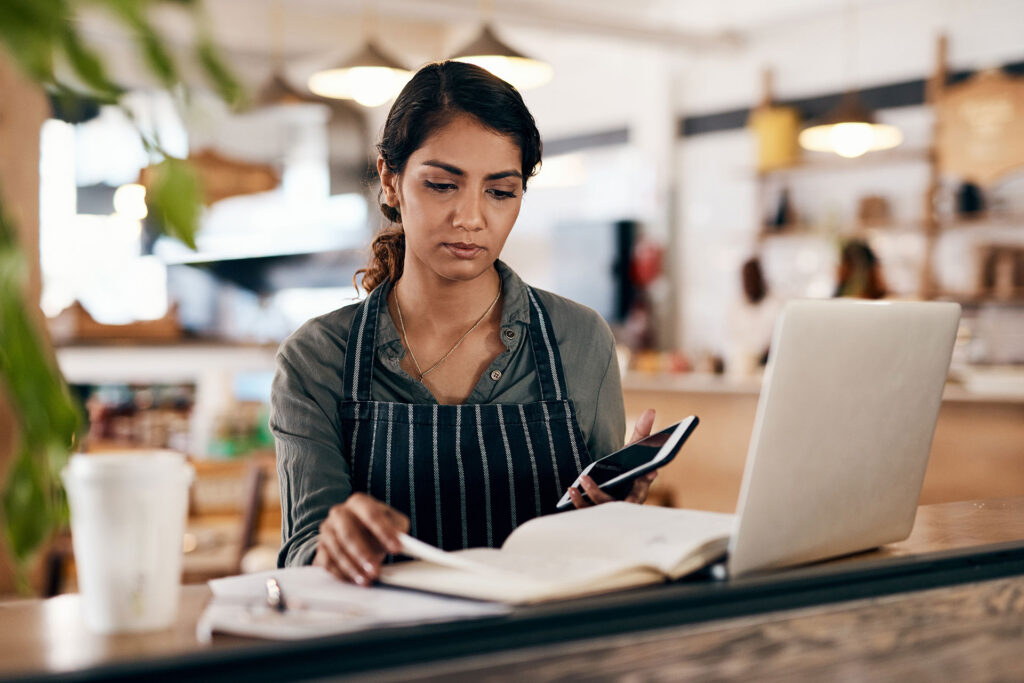 a small business owner looking at the benefits of local seo