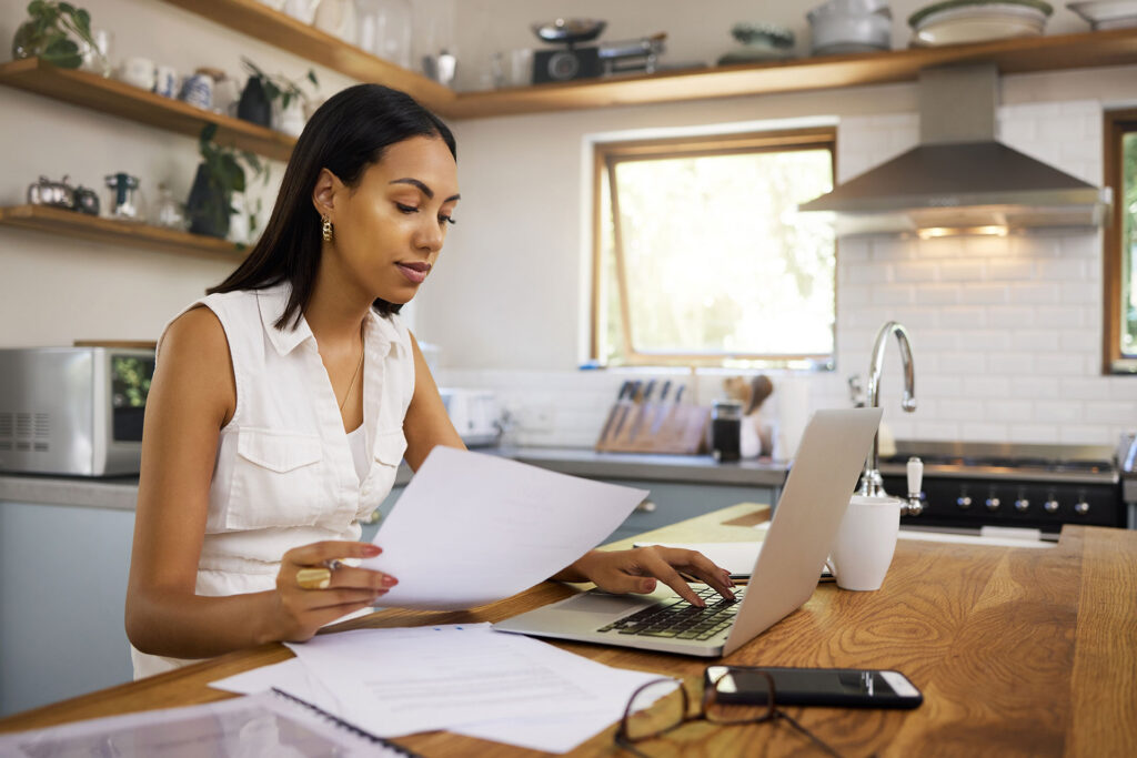 a business owner considering the next steps of a website audit checklist