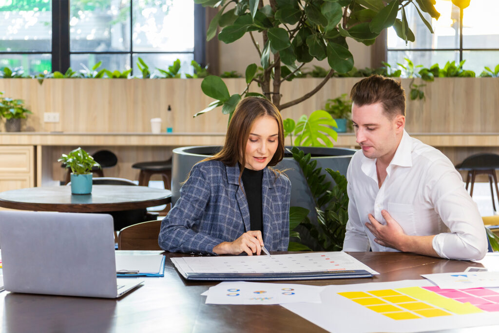 business owners discussing sustainable web design