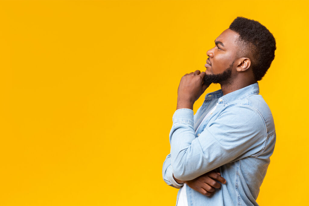 a man thinking about building backlinks without paying for them