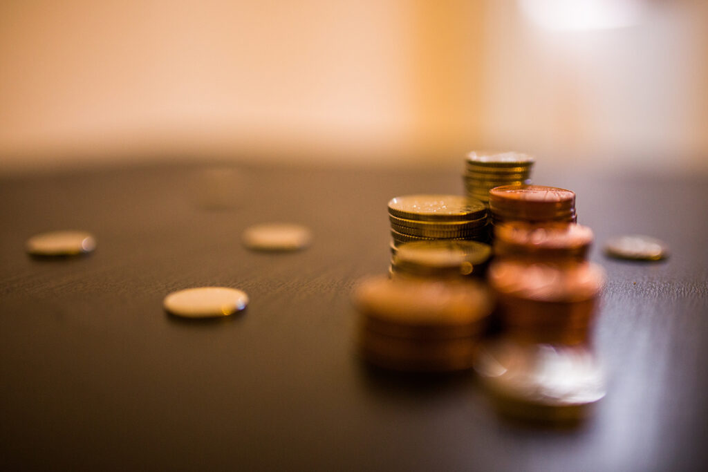 a concept of seo costs with stacks of coins
