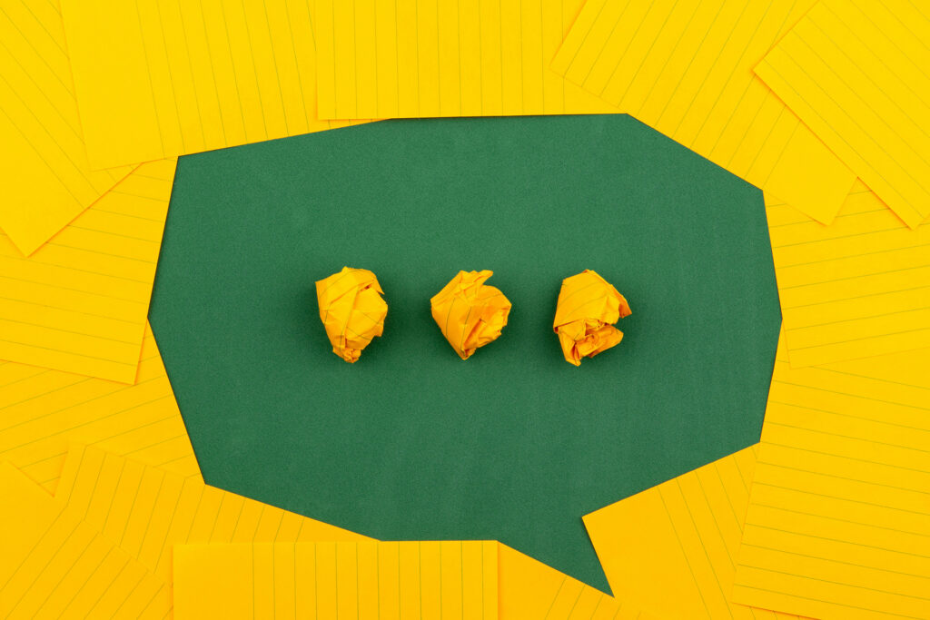 a chat bubble made of crumpled paper representing the social media aspect of local online marketing