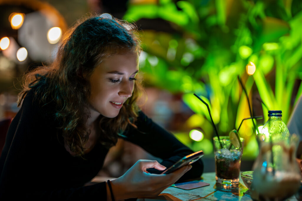 an influencer and customer posting about a successful bar on social media