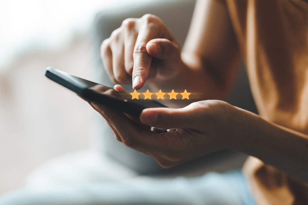 a customer leaving a review on their phone