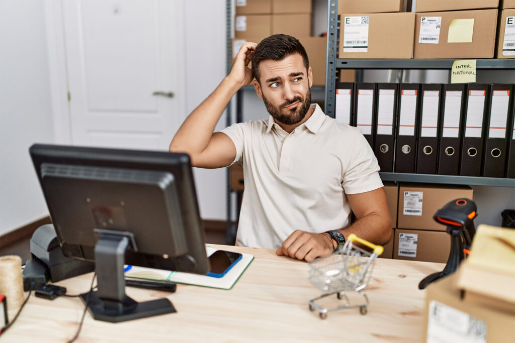 a manager thinking about small business growth at his desk