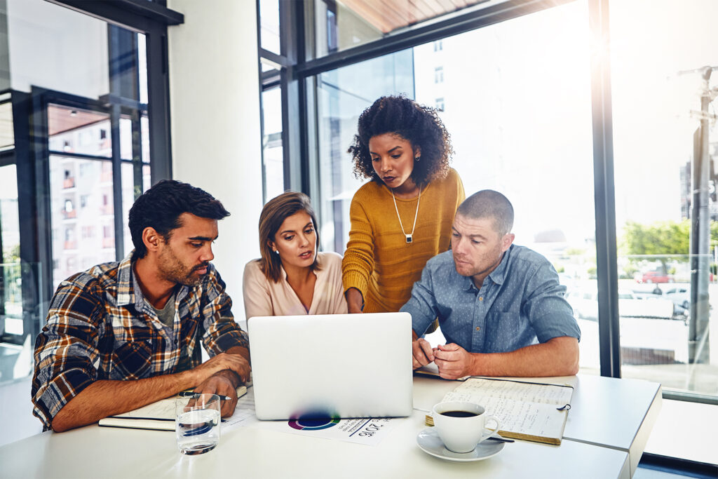 a team of web developers working on improving a clients website