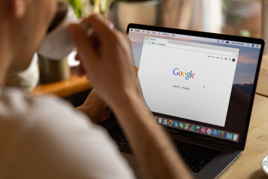 a potential customer browsing google on a laptop