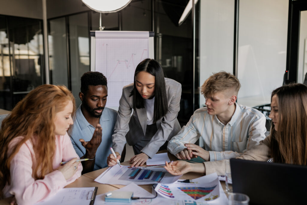 a digital marketing team strategising around PPC ads