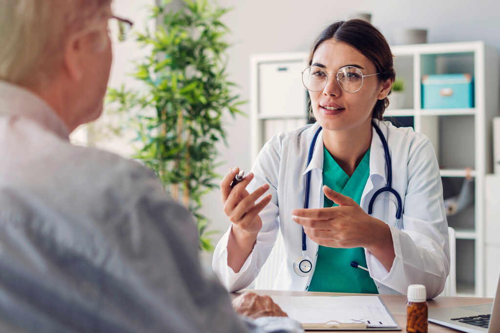 a doctor talking to her consultant about her healthcare marketing strategy