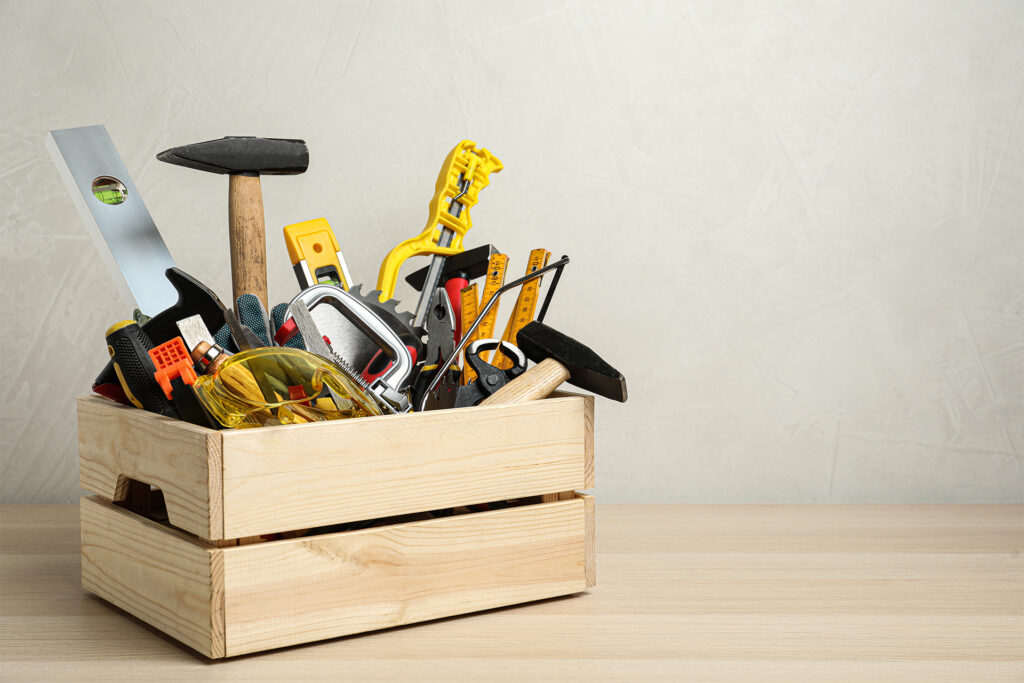 a wooden crate toolkit on a wooden top