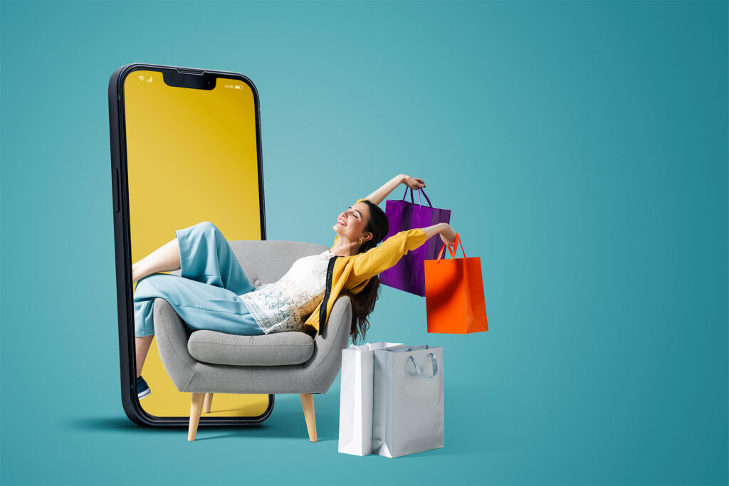 a woman sitting on an armchair holding tons of shopping bags coming out of a portal into a mobile phone