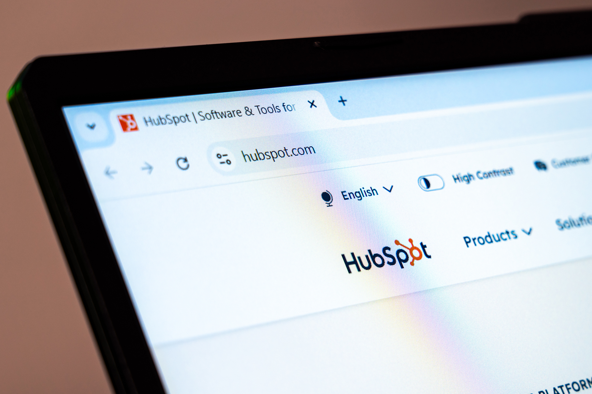 The HubSpot website on a laptop screen