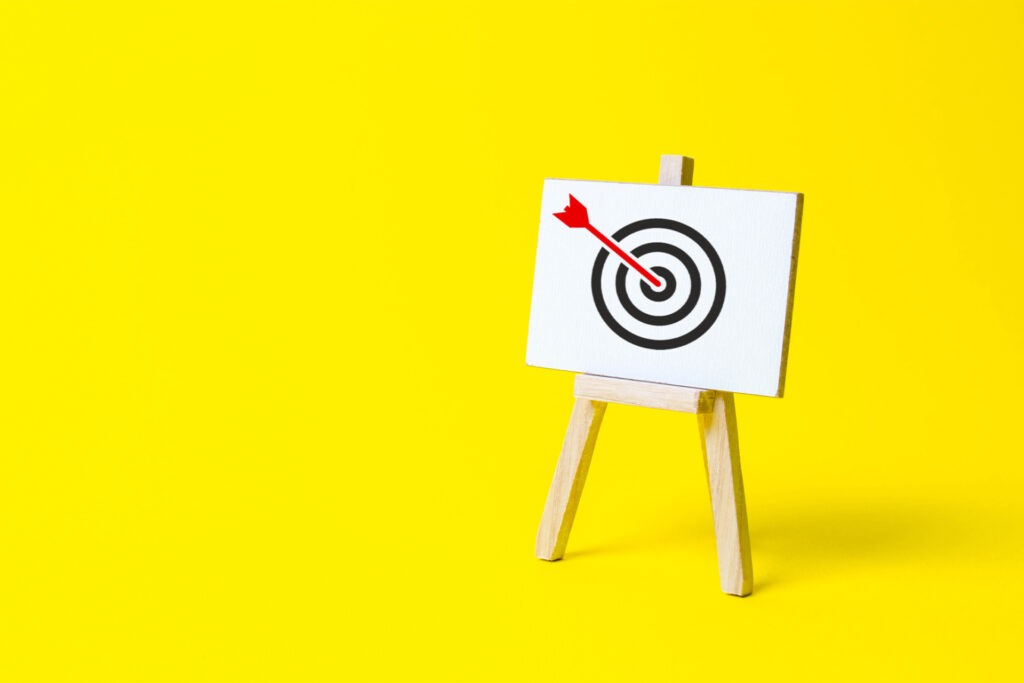 a target sign on a yellow background