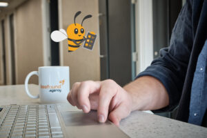 beefound.agency conducting a website migration SEO checklist with the help of our bee mascot who is holding a clip board